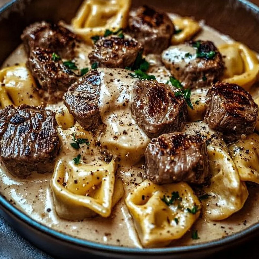 Cracked Garlic Steak Tortellini served in a creamy sauce with herbs