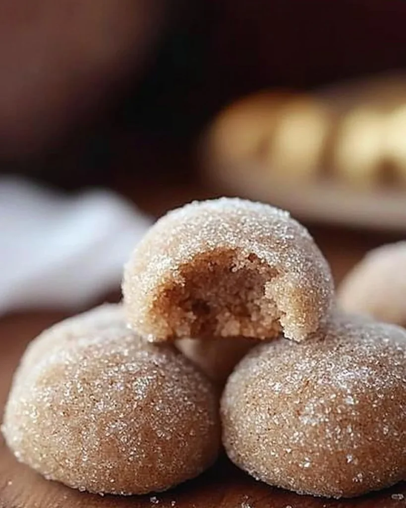 Cinnamon Sugar Snowball Cookies dusted with powdered sugar