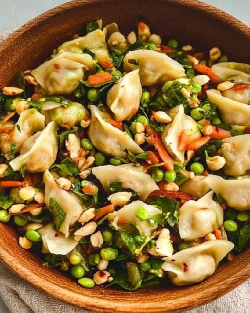 Colorful and fresh Dumpling Salad with various vegetables and dumplings