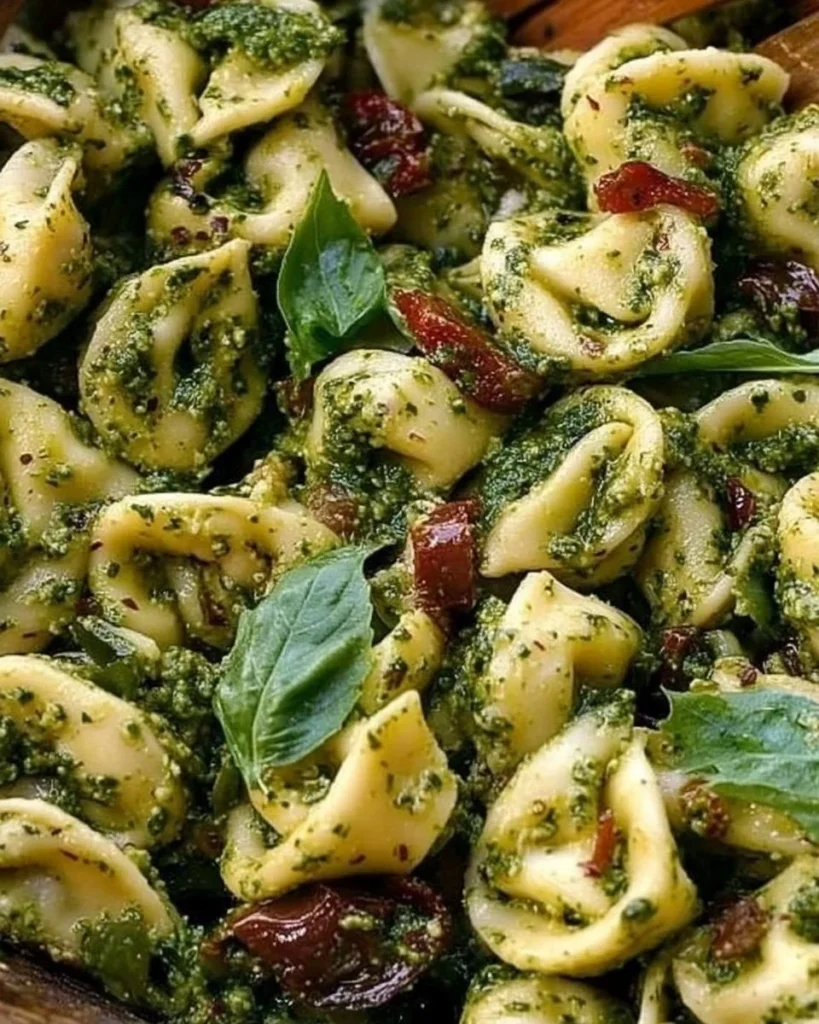 Colorful Pesto Tortellini Pasta Salad with fresh vegetables