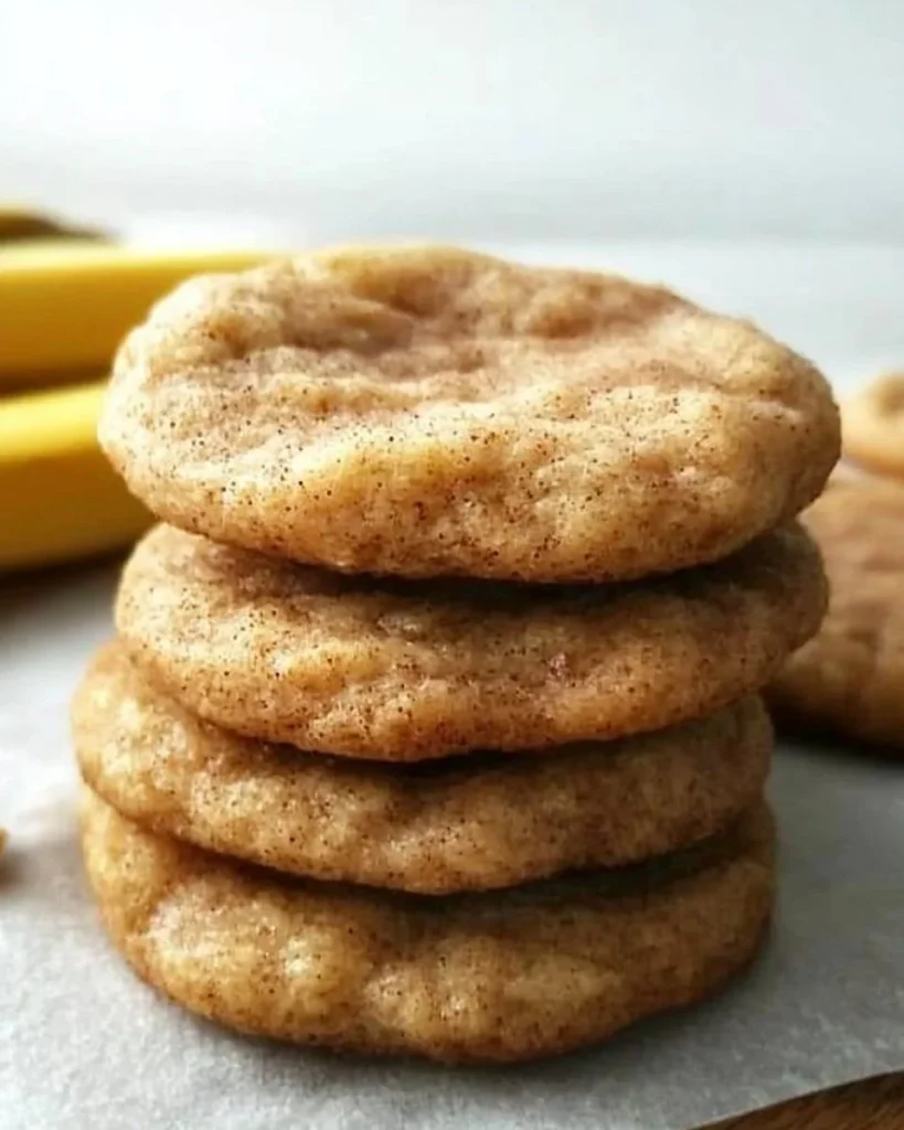 Delicious batch of Banana Snickerdoodles cookies on a wooden table